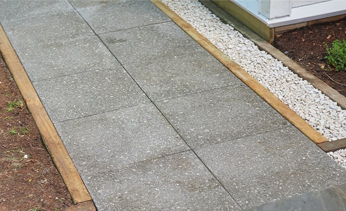 How to lay concrete pavers on sand